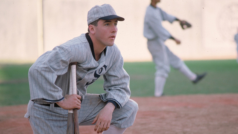 Buck Weaver (John Cusack) prepares to swing a baseball bat in Eight Men Out