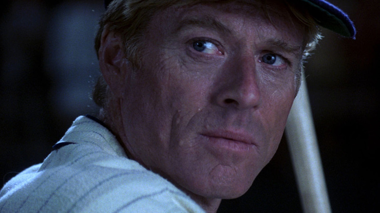 Roy Hobbs (Robert Redford) prepares to swing a baseball bat in The Natural
