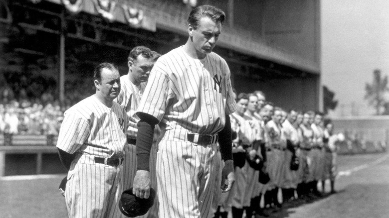 Lou Gehrig (Gary Cooper) looks downcast on the field in his Yankees uniform in The Pride of the Yankees