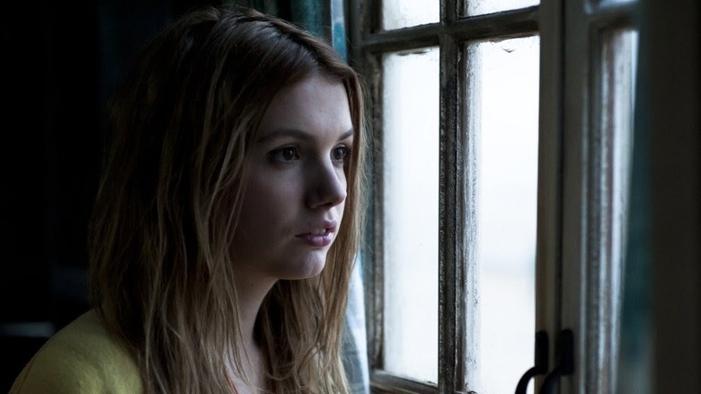 Hannah Murray as Cassie staring out a window in Skins