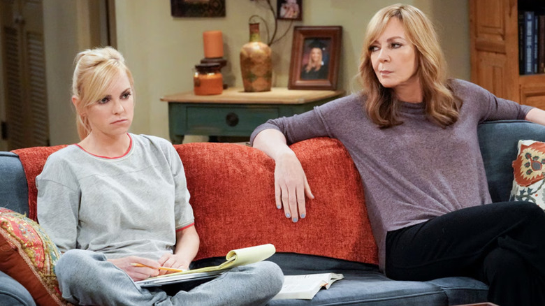 Christy and Bonnie sitting on the couch in Mom