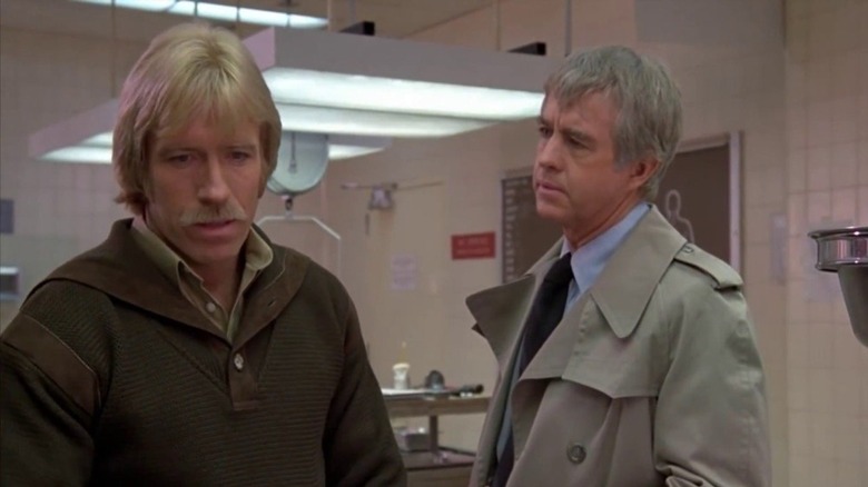Chuck Norris as Logan and Clu Gulager as Dunne in A Force of One