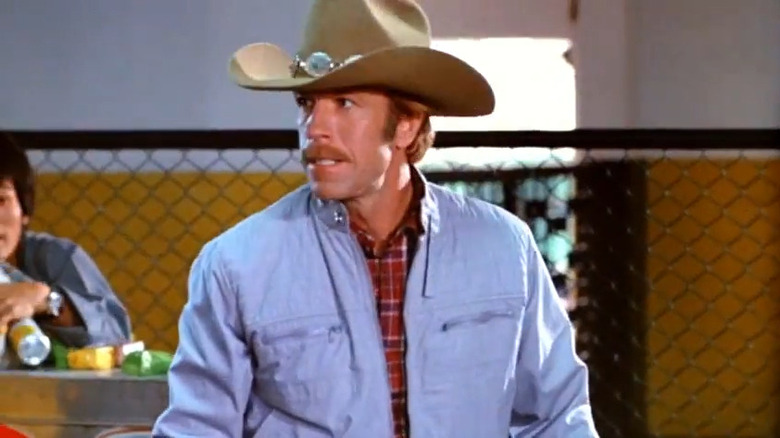 Chuck Norris as Randall wearing a cowboy hat in Forced Vengeance