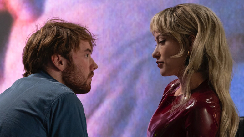 Elliot (Cooper Hoffman) and Erika (Olivia Wilde) savor the sexual tension between them in I Want Your Sex