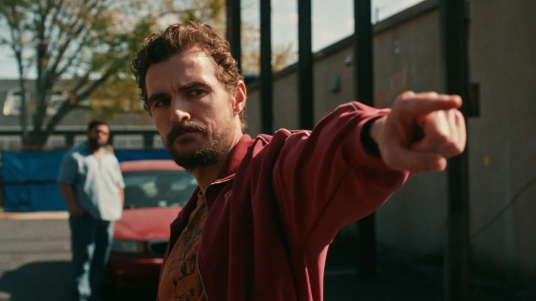 Mark (Dave Franco) gives the point of respect while Davis (O'Shea Jackson Jr.) looks on in Idiots