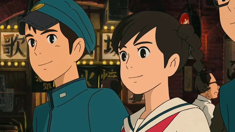 Umi Matsuzaki and Shun Kazama walk smiling through town in From Up on Poppy Hill