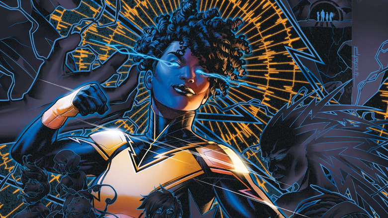 Anissa Pierce surrounded by electric inspired art