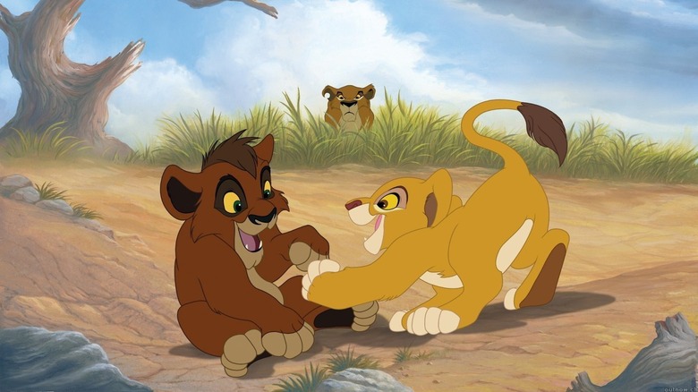 Dark-colored lion cub (Kovu) playing with light-colored lion cub (Kiara) in The Lion King II: Simba's Pride
