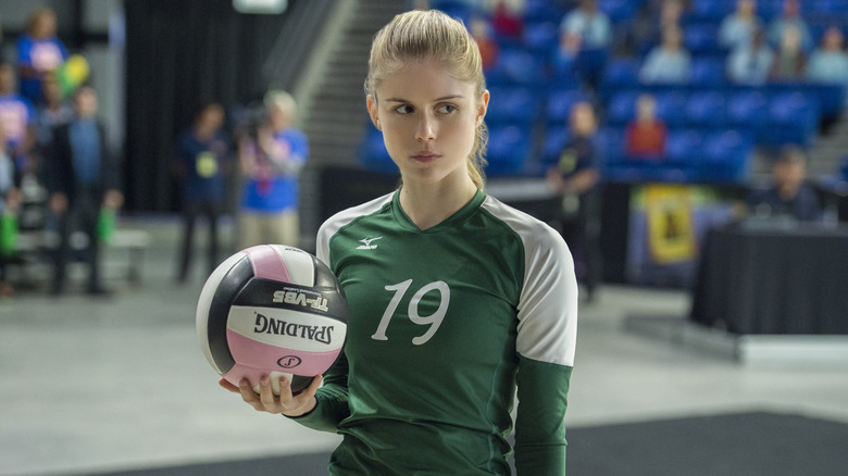 Moriarty holding volleyball