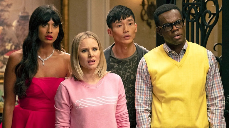 Tahani, Eleanor, Jason, and Chidi looking collectively outraged on The Good Place