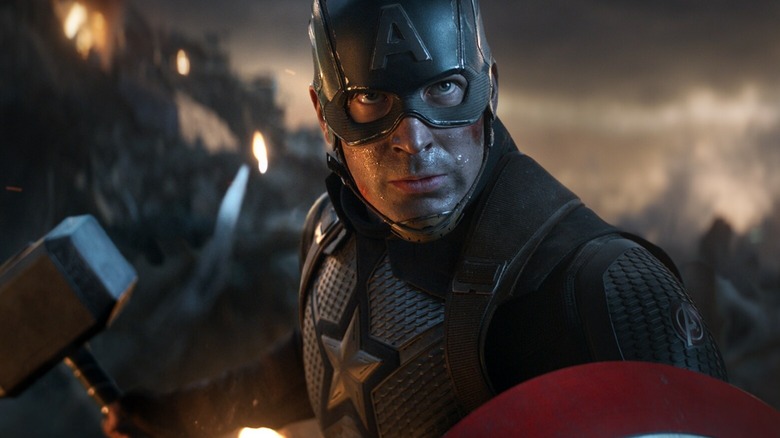 Chris Evans as Captain America wielding Thor's hammer in Avengers: Endgame