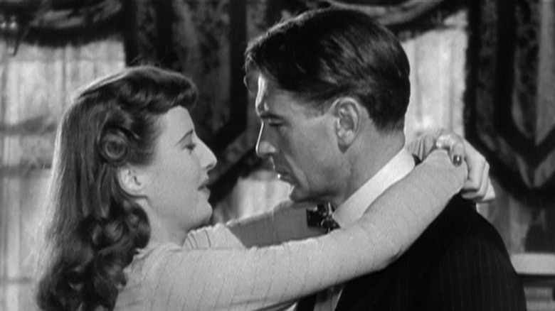 Sugarpuss (Barbara Stanwyck) and Pottsy (Gary Cooper) embracing in Ball of Fire