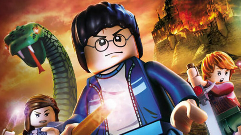 LEGO Harry Potter stands before Hermione and Ron
