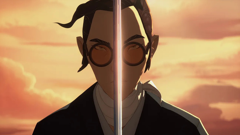 Mizu holds up a sword in Blue Eye Samurai.