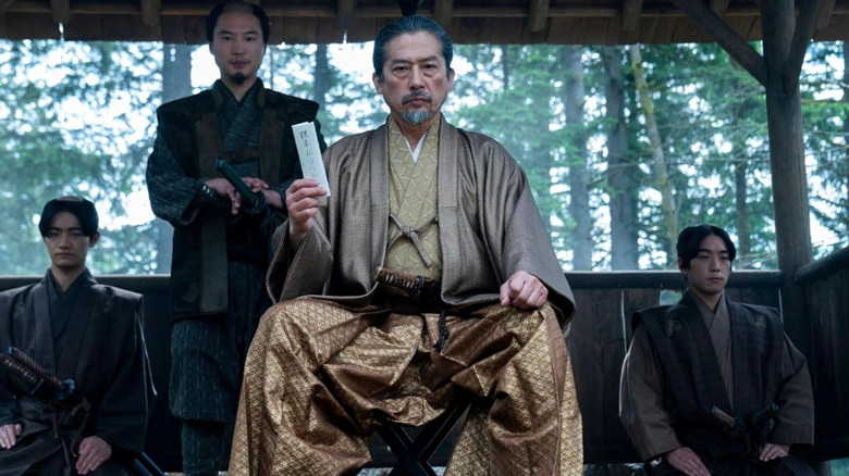 Hiroyuki Sanada as Lord Yoshii Toranaga, looking down from his seat in Shōgun.