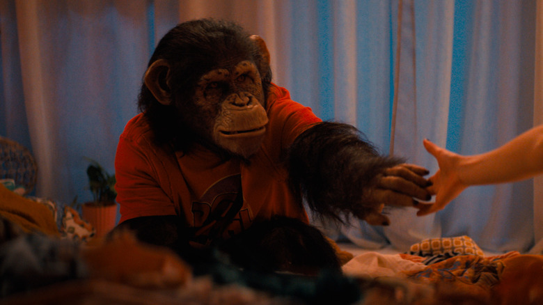 Ben shaking hands with one of the girls in Primate