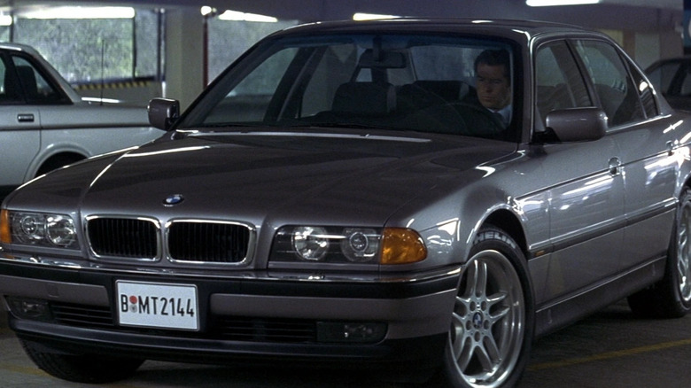 James Bond (Pierce Brosnan) sits in his parked BMW in Tomorrow Never Dies