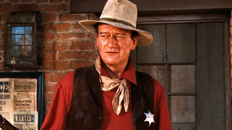 John Wayne as Sheriff John T. Chance in Rio Bravo