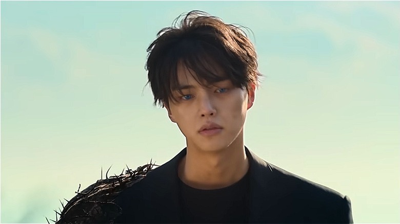 Hyun-su (Song Kang) holds a spear in Sweet Home