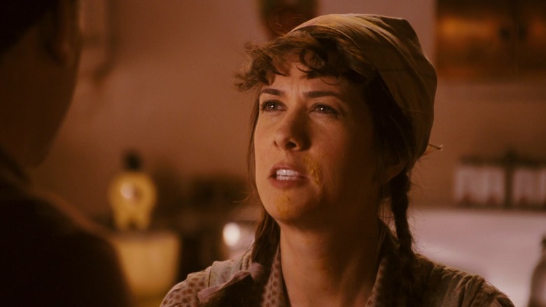 Kristen Wiig squinting her eyes in disgust in Walk Hard: The Dewey Cox Story