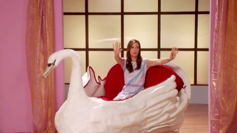 Kristen Wiig sitting in swan boat in Welcome To Me