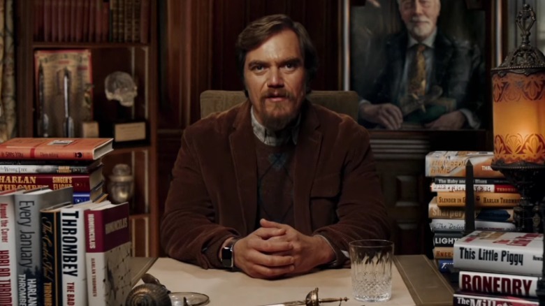 Walt sits at his desk