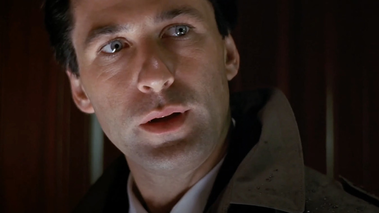 Alec Baldwin as Jack Ryan looks shocked in The Hunt for Red October