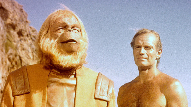 Maurice Evans as Dr. Zaius and Charlton Heston as George Taylor on the beach in Planet of the Apes