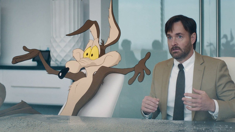 Wile E. Coyote and Kevin Avery sit at a table in Coyote vs. Acme