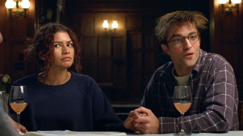 Emma and Charlie engage in an awkward dinner-table conversation in The Drama