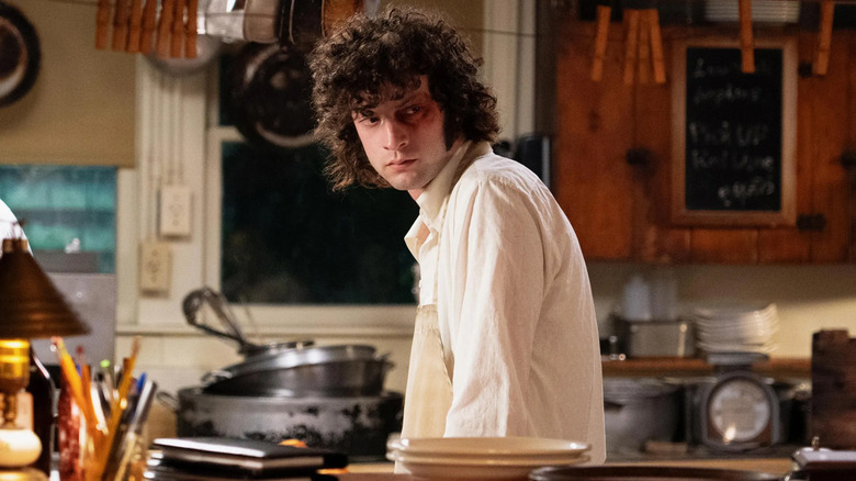 Tony in the kitchen with a black eye in Tony