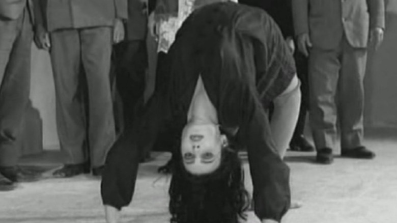 Purif bent over