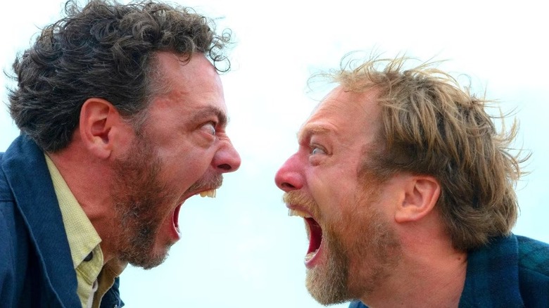 Patrick (Fedja van Huêt) and Bjørn (Morten Burian) scream in each others' faces in Speak No Evil (2022)