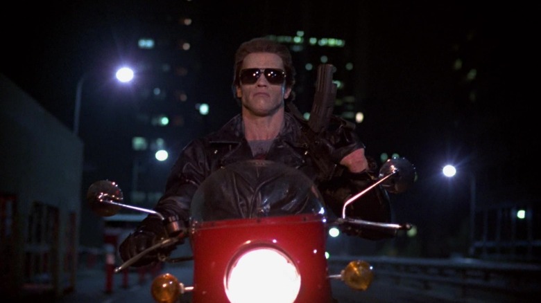 Arnold Schwarzenegger's Terminator riding a motorcycle in The Terminator