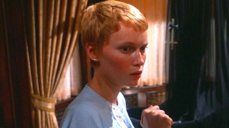 Rosemary (Mia Farrow) looks cautiously in Rosemary's Baby