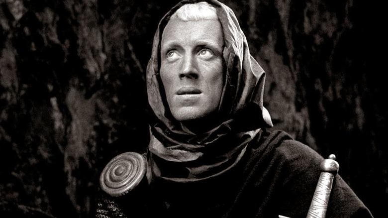 Max von Sydow is a knight burdened with horrible philosophical weight, while wearing a cloak, in The Seventh Seal