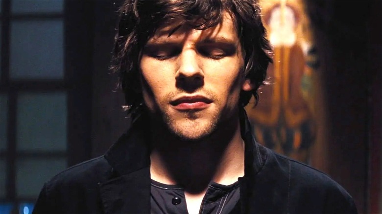 Jesse Eisenberg in Now You See Me surrounding by cards featuring Jacob Latimore in Sleight, Steve Carell in Incredible Burt Wonderstone, George Clooney in Ocean's Eleven and Edward Norton in The Illusionist