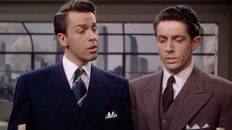 Brandon Shaw (John Dall) and Phillip Morgan (Farley Granger) speak to each other in a penthouse apartment in Rope