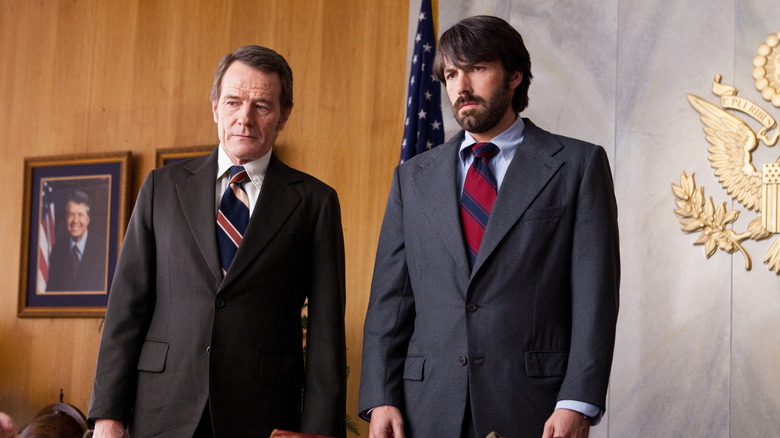 Bryan Cranston as Jack O'Donnell and Ben Affleck as Tony Mendez in Argo.