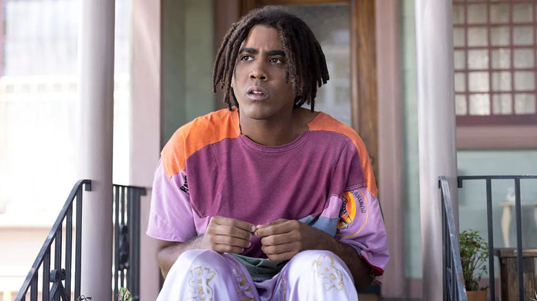 Jharrel Jerome as Cootie, sitting on his steps, in I'm a Virgo.