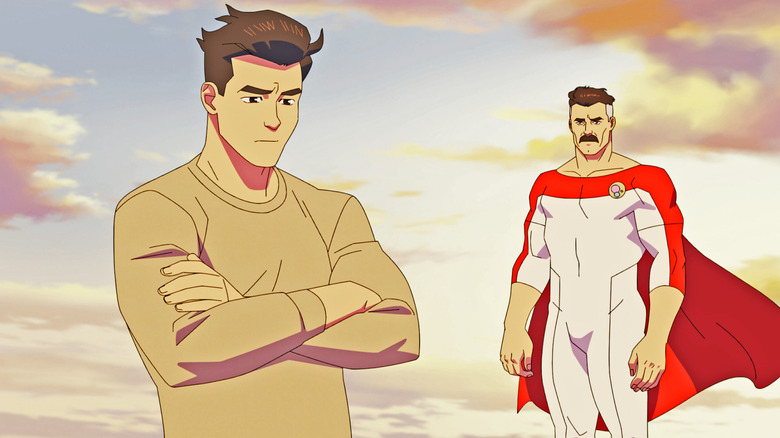 Mark and Nolan Grayson, flying together in a discussion, in Invincible.