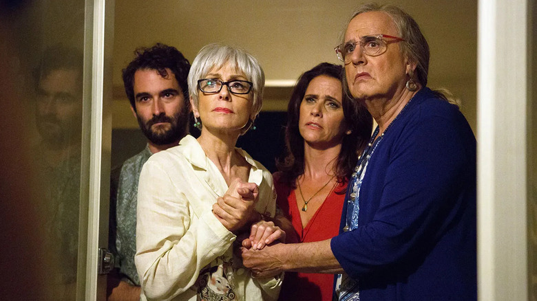 The Pfefferman family, holding hands and standing together, in Transparent.