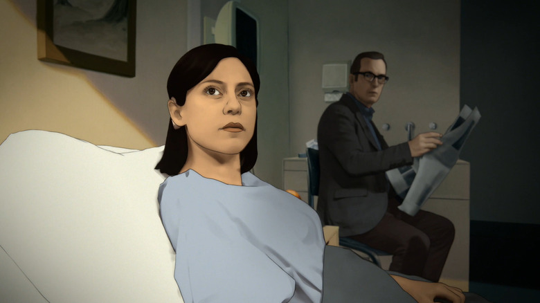 Rosa Salazar as Alma Winograd-Diaz and Bob Odenkirk as Jacob Winograd, sitting together in her hospital room as she stares out the window, in Undone.