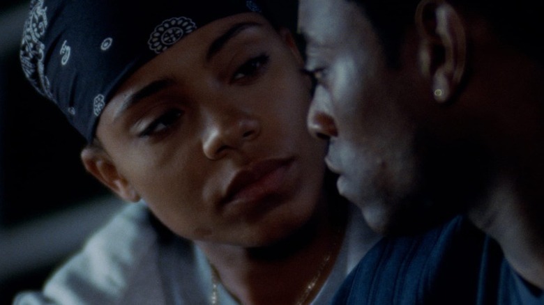 Sanaa Lathan as Monica Wright and Omar Epps as Quincy McCall talking in Love & Basketball