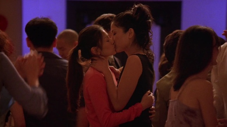 Michelle Krusiec as Wilhelmina Pang and Lynn Chen as Vivian Shing kissing in Saving Face