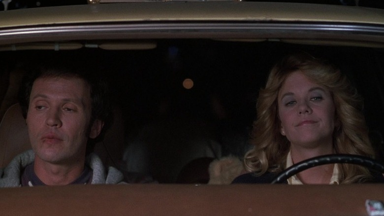 Billy Crystal as Harry Burns and Meg Ryan as Sally Albright driving in When Harry Met Sally...