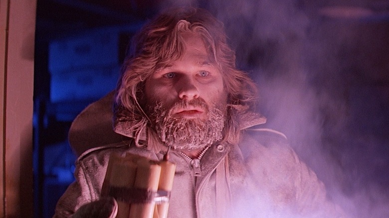 MacReady (Kurt Russell) holding dynamite in 1982's The Thing
