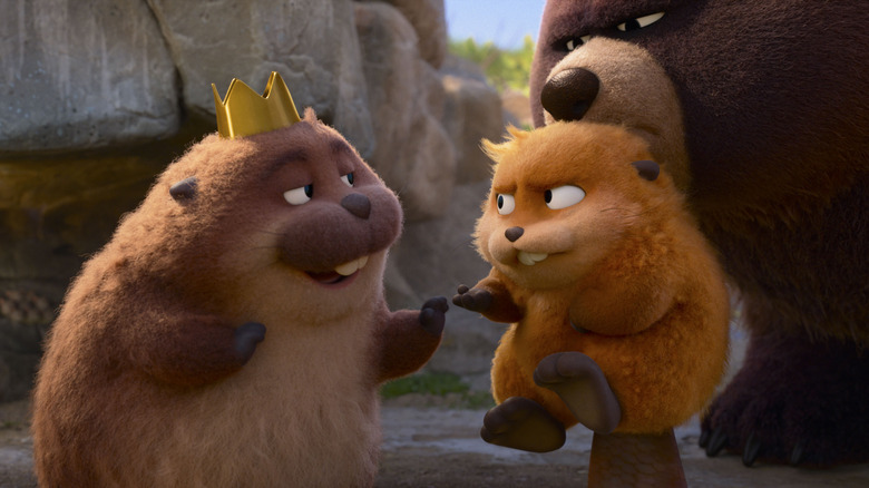 King George talking to Mabel (as a beaver) while Ellen Bear holds Mabel in her mouth in Hoppers