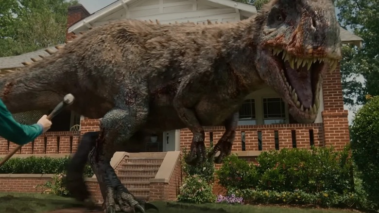 The allosaurus getting ready to fight Ewan McGregor as Greg Platt in The End of Oak Street