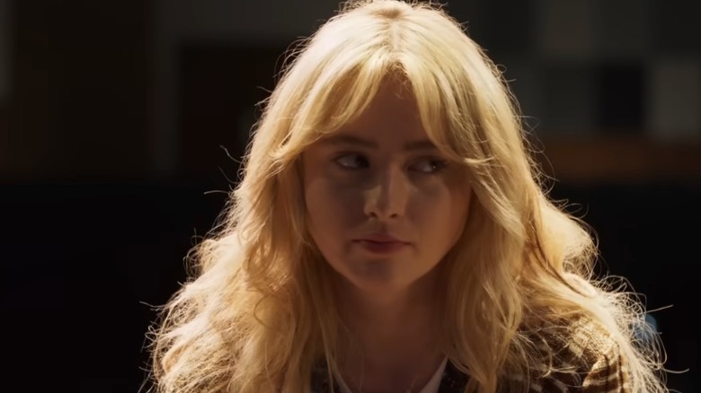 Kathryn Newton staring off to the left